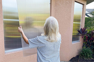 Clear hurricane shutters on home windows