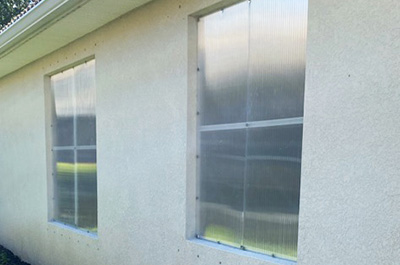 Hurricane shutter installation demonstration